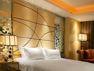 Haishu Taosheng Yiju Business Hotel Ningbo Buitenkant foto